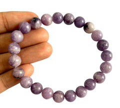 CRYSTALMIRACLE Lepidolite beads on wrist for balance