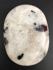 CRYSTALMIRACLE Rainbow Moonstone handheld palmstone for chakra balancing rituals.