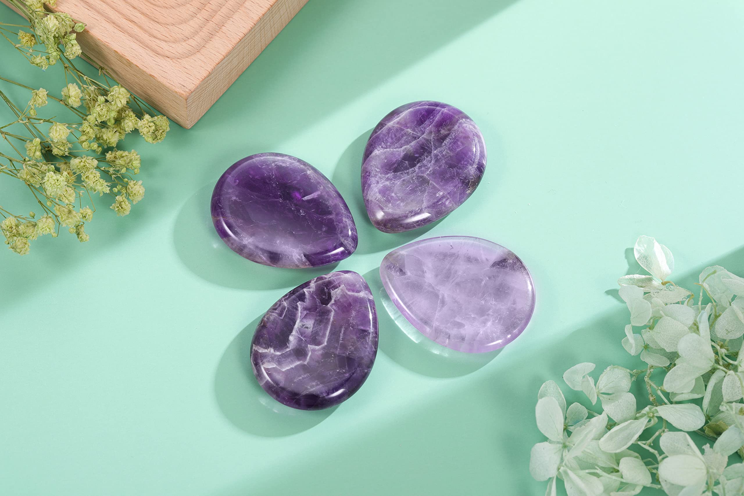 CrystalTears amethyst palm stone displaying rich purple hues for grounding moments