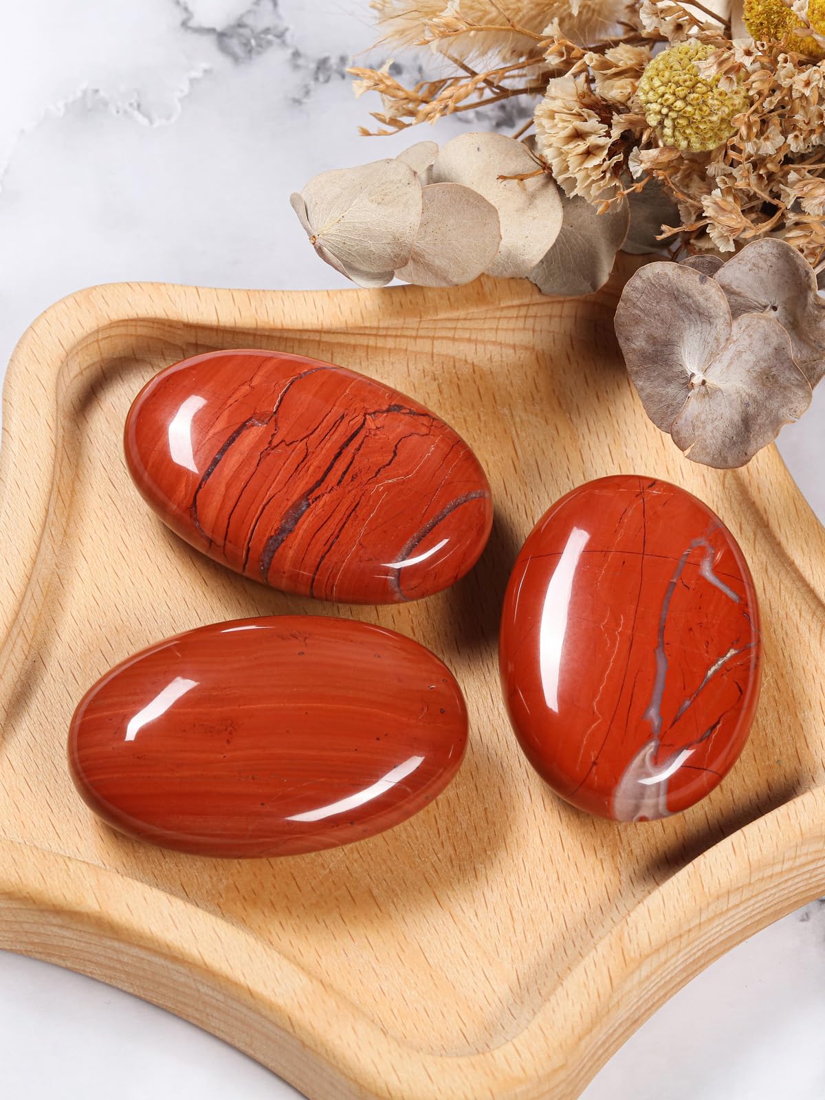CrystalTears Red Jasper polished oval stone supports meditation and grounding during tense moments.