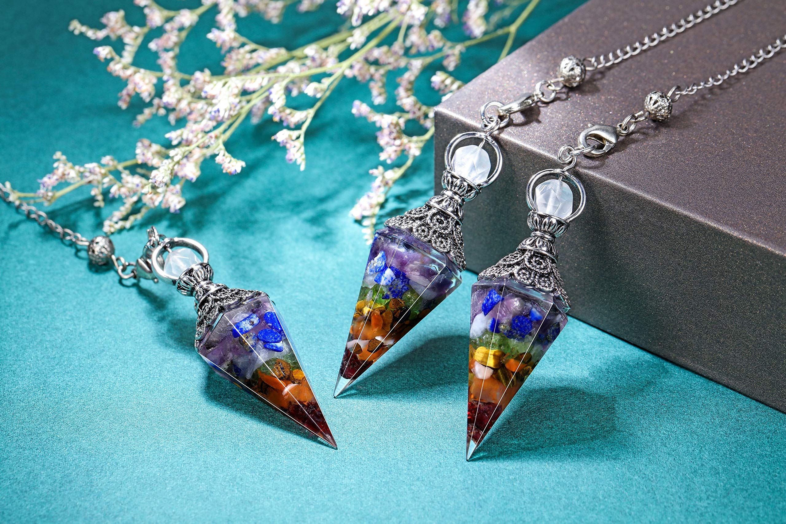 CrystalTears Reiki healing pendulum hexagonal form for meditative clarity and guidance.