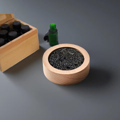 CUIYKAI lava rock diffuser on a clean office desk showing natural texture.