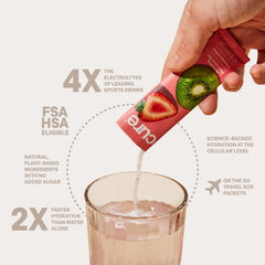 Glass with prepared Cure Hydration blood orange drink