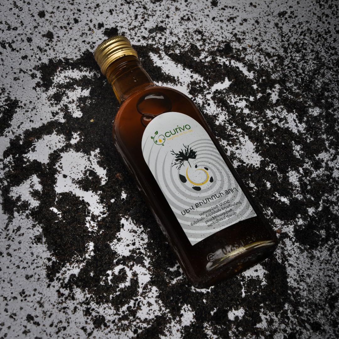 Curivo Black Cumin Seed Oil in a dish shows easy mixing with yogurt or juice