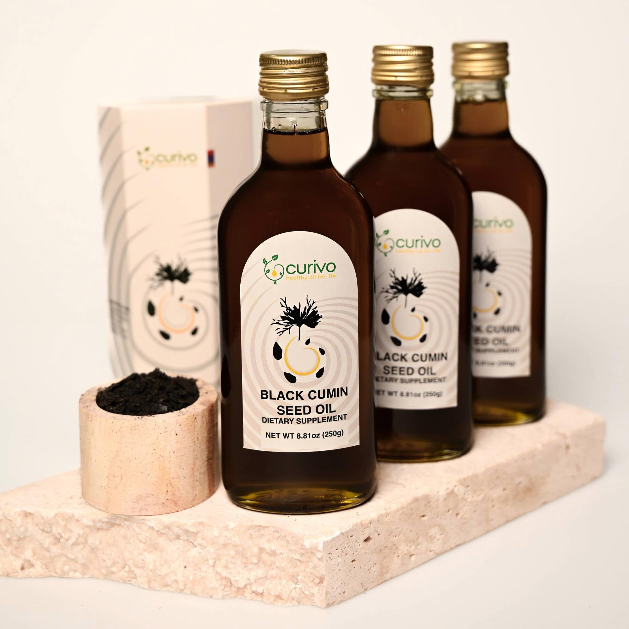 Curivo Black Cumin Seed Oil pour demonstrates easy daily intake for metabolism support