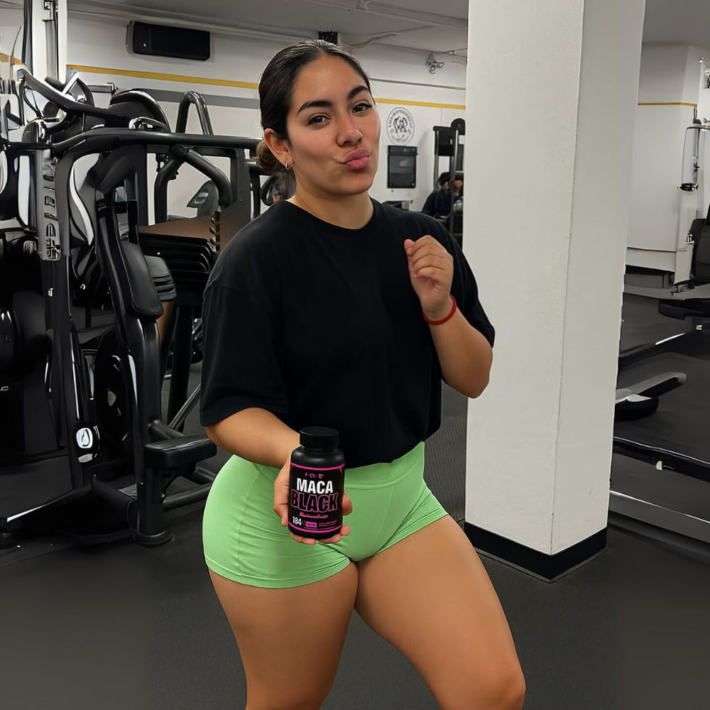 Maca pills in hand for on-the-go routine.