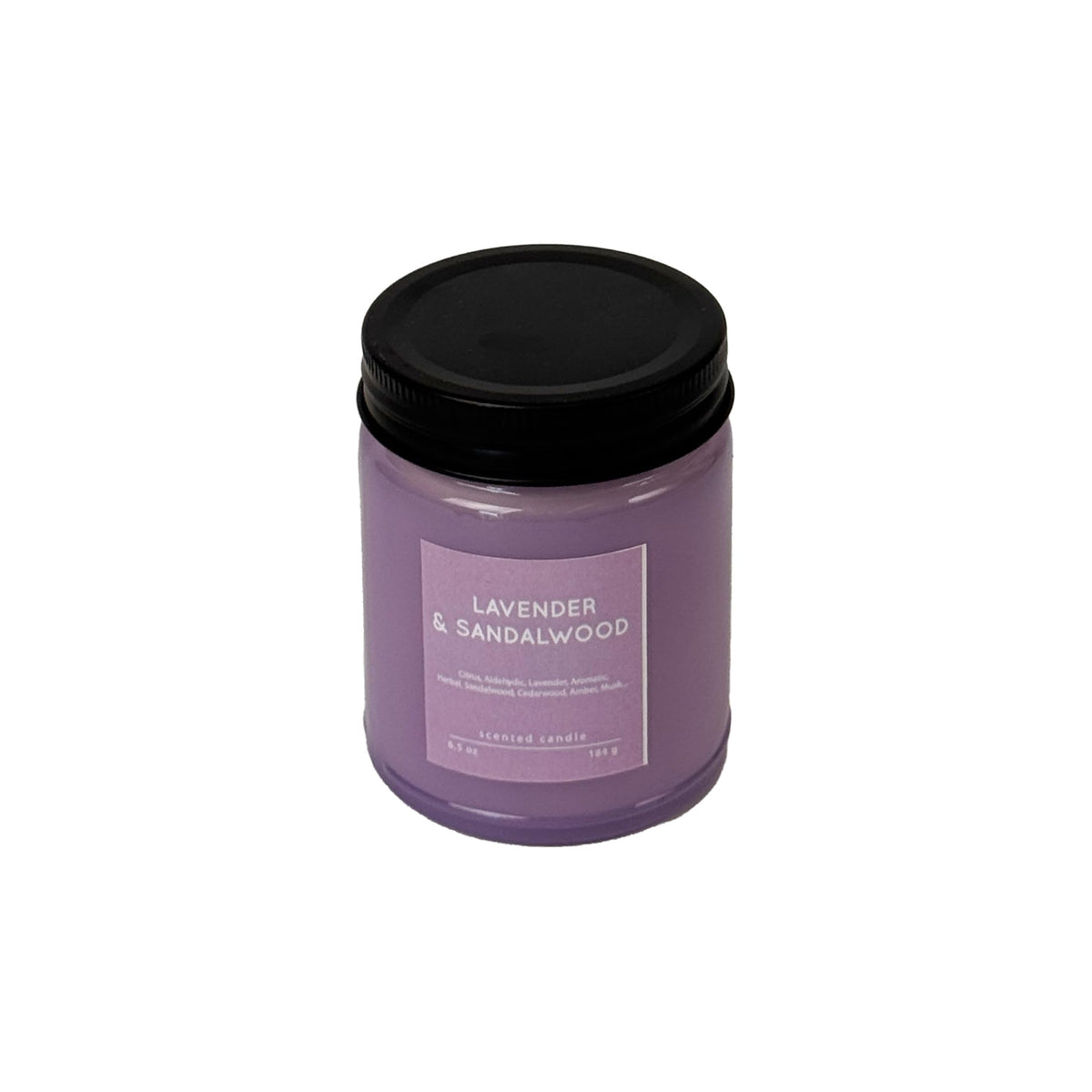 CW Studio Lavender & Sandalwood candle in color glass jar for calm evenings.