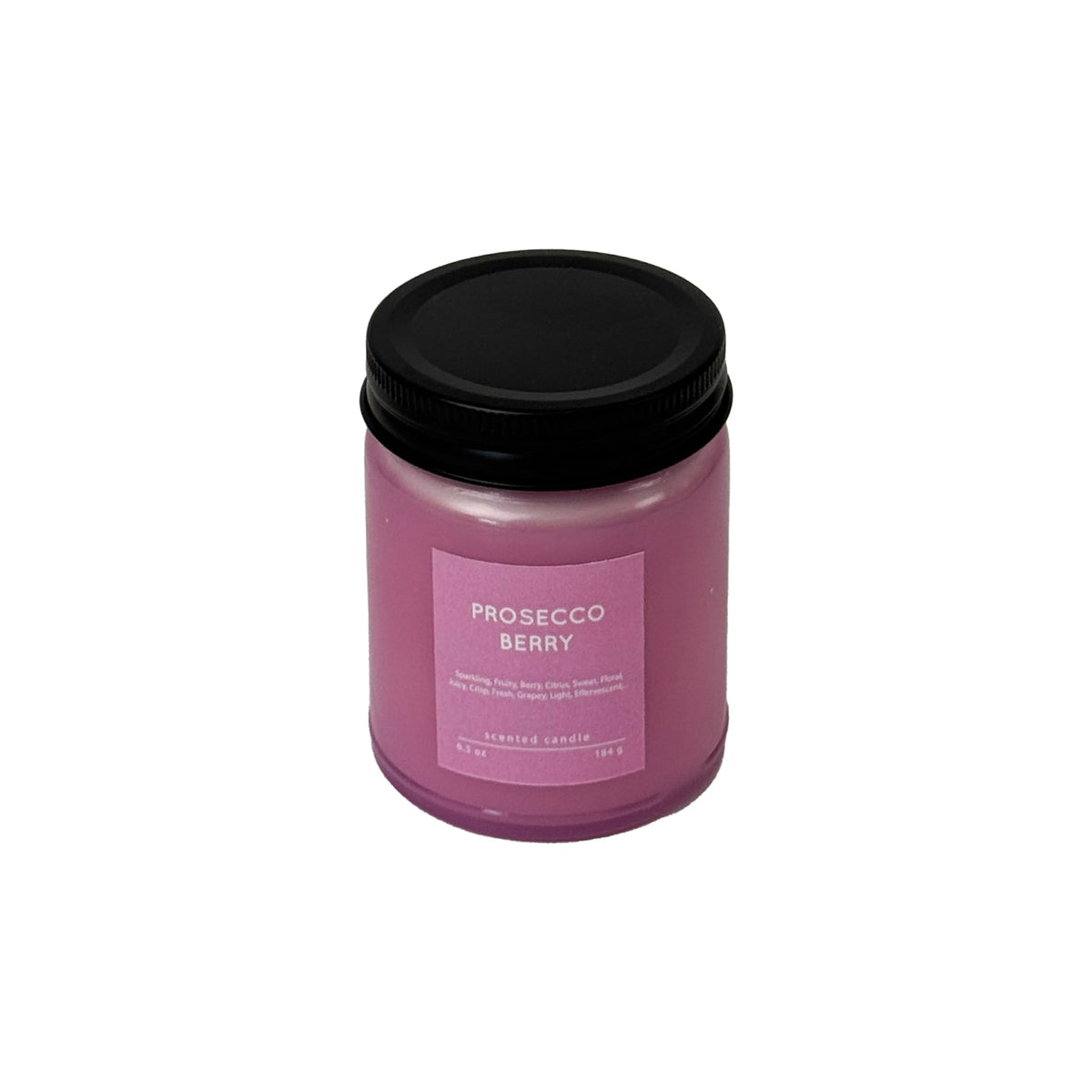 CW STUDIO Prosecco Berry Candle in a glass jar enhances any room with sparkling fragrance.