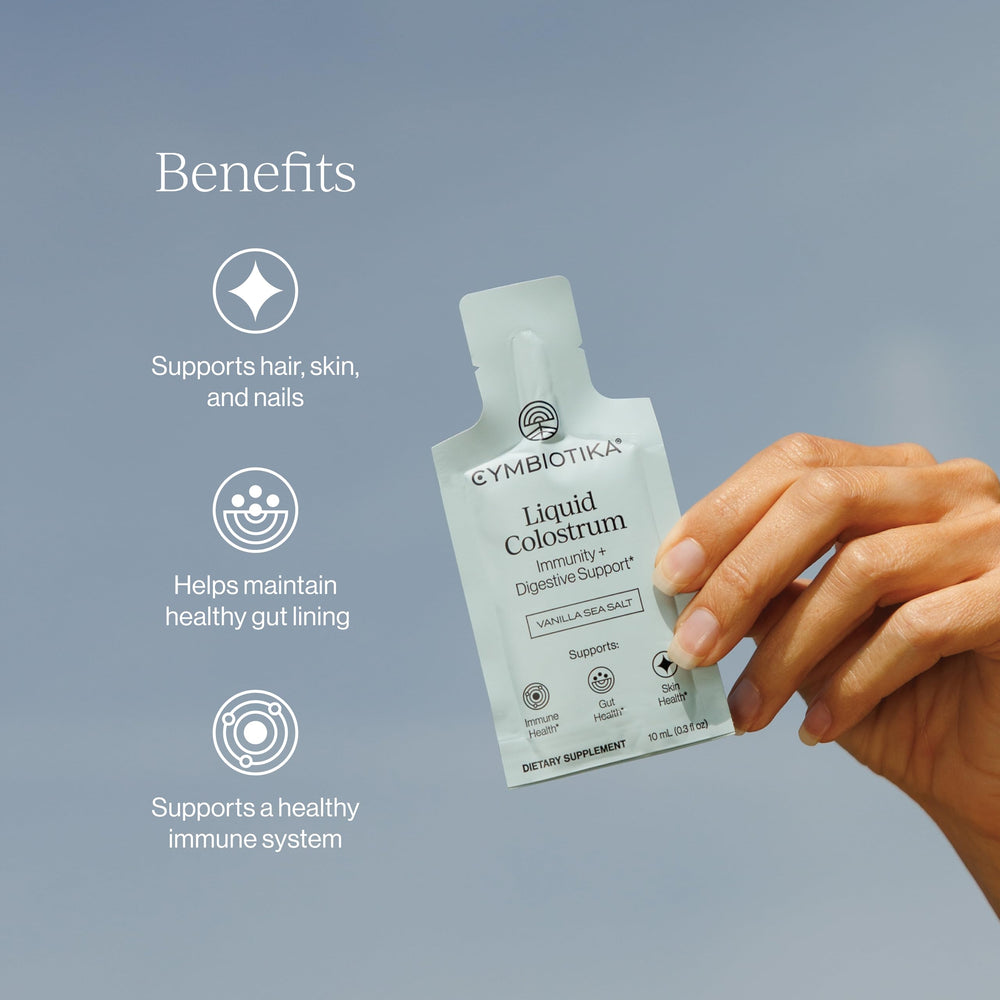 CYMBIOTIKA daily packets ready for on-the-go immune and gut wellness.