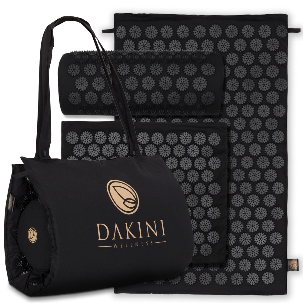 Dakini travel-ready case showcasing compact roll-up and secure clasps.