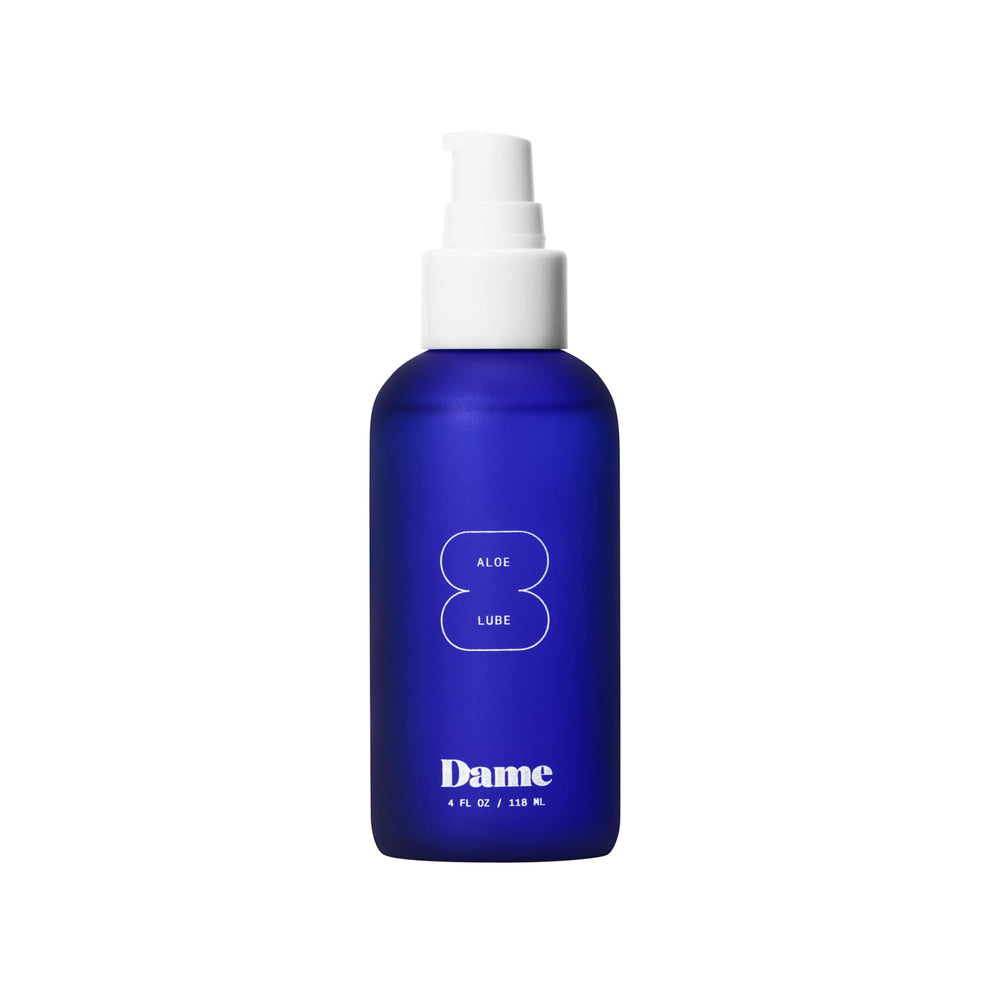 Dame Aloe Lube bottle pour showing silky glide for comfortable intimacy.