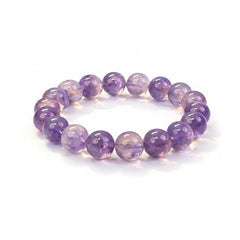 Dare to Mystic amethyst rutilated quartz bracelet close-up highlighting rutile threads for focus