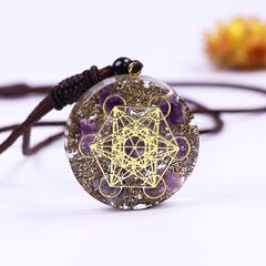 Day Day Up pendant showing amethysts on the cube to attract positive energy.
