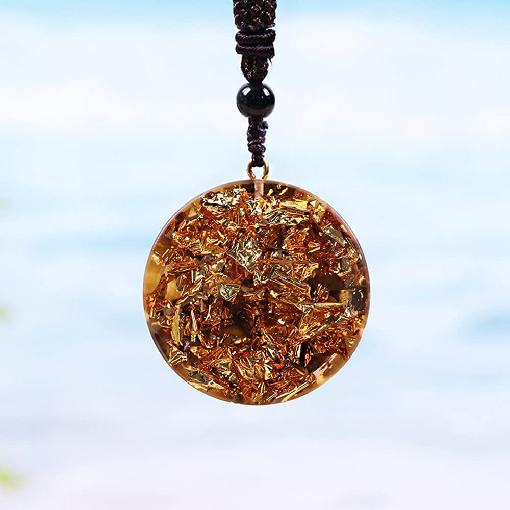 Day Day Up orgonite necklace emitting ethereal glow