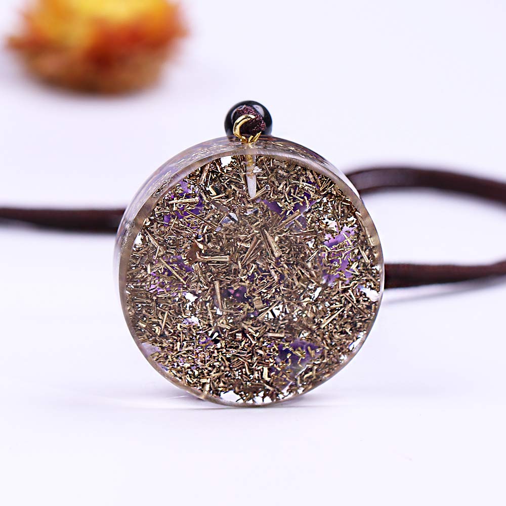 Day Day Up resin-and-metal artwork necklace with seven amethysts enhances focus.