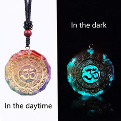 Resin-sealed Day Day Up orgonite pendant detail with copper energy symbol.