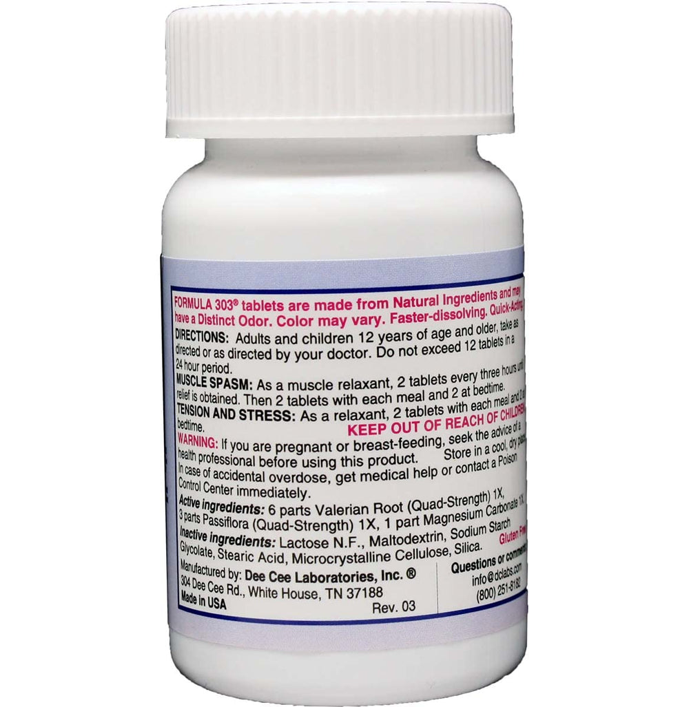 Formula 303 tablets close-up showing valerian and magnesium herbal blend