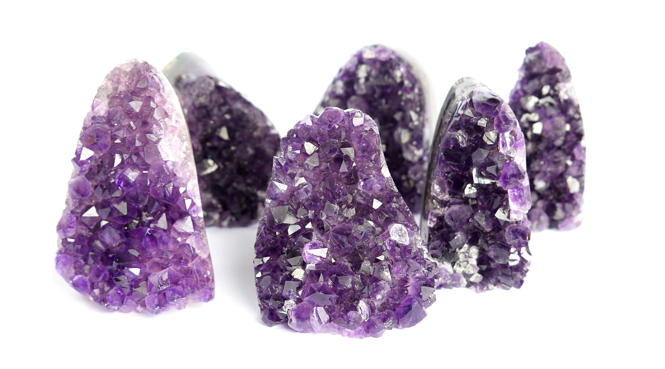 Deep Purple Project amethyst crystal layers reveal intricate formations under light.