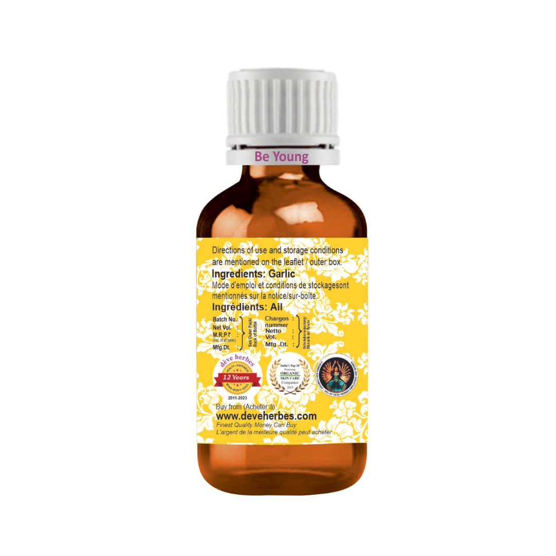 Pouring Deve Herbes Garlic Essential Oil shows light, non-greasy texture