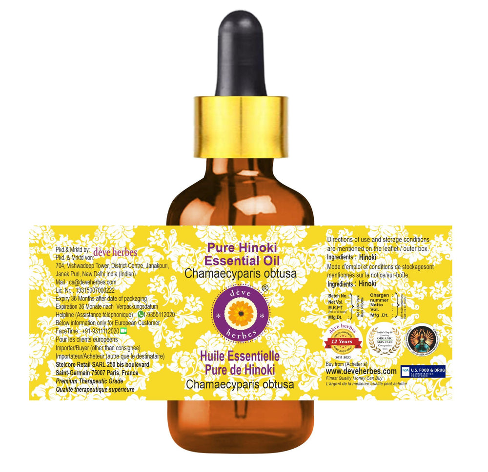 Hinoki essential oil dropper close-up showing precise dosing