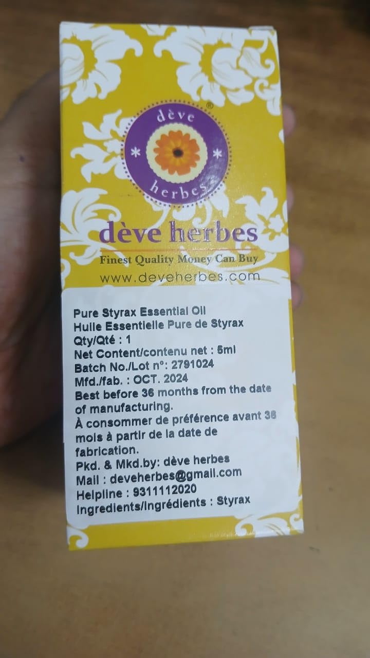 closeup of Styrax essential oil label showing steam-distilled origin
