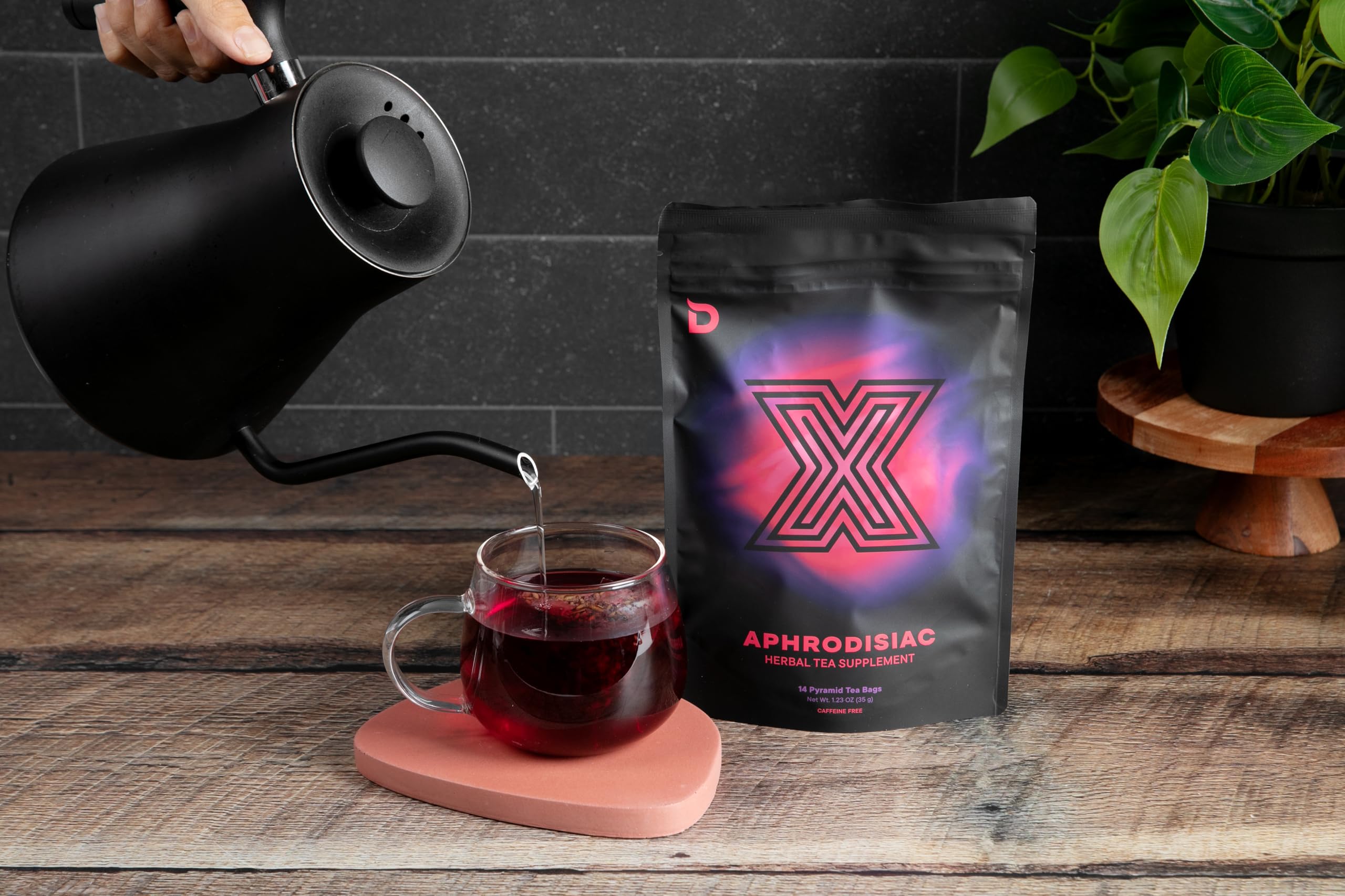 Glass mug with Deviant Blends tea highlighting sugar-free, gluten-free recipe