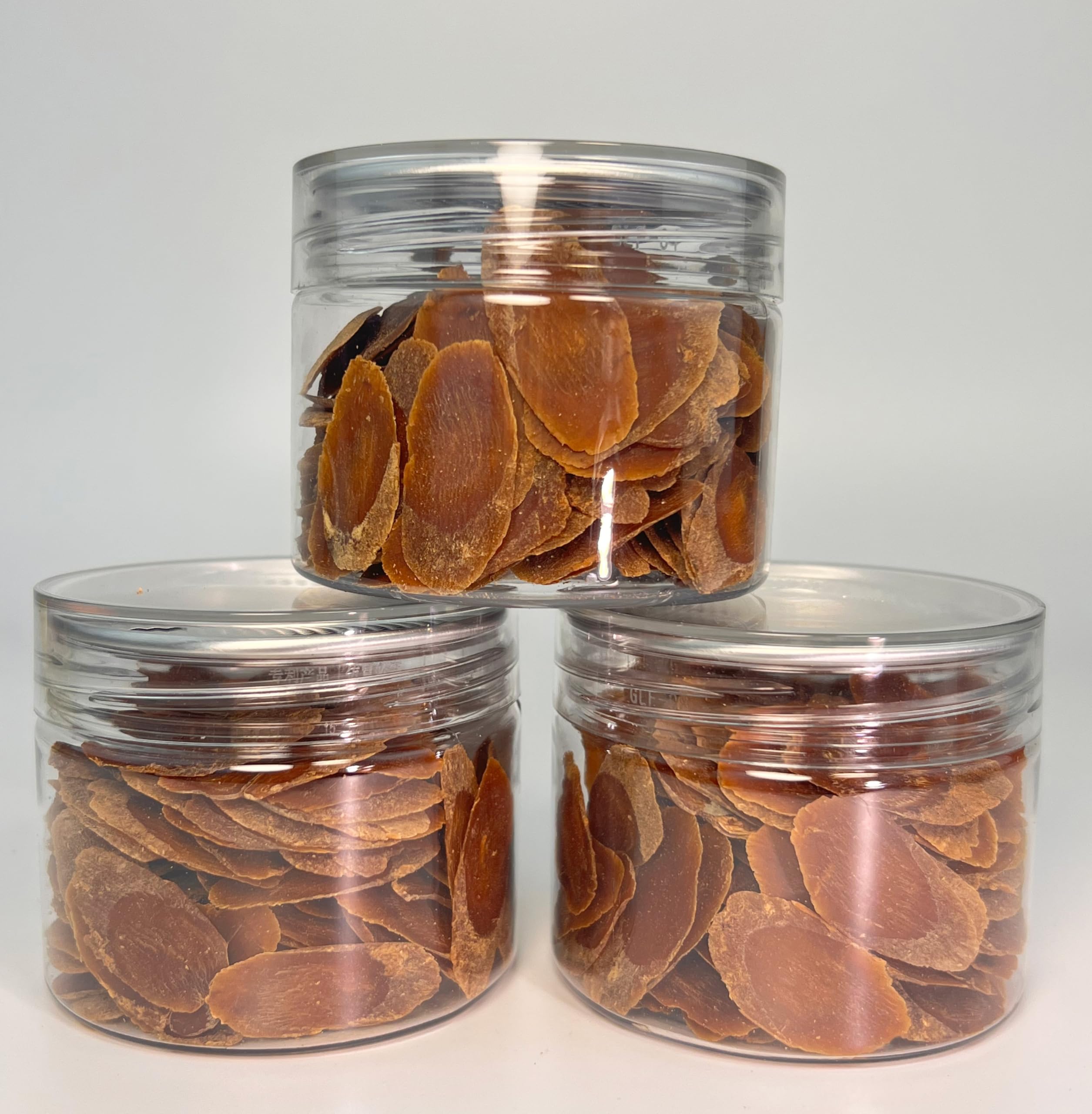 Dian Mai Hao red ginseng slices in tea cup suggest daily wellness ritual.