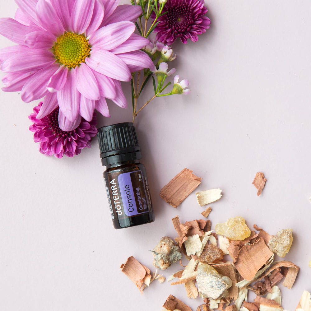 doTERRA Console bottle closeup highlighting calming floral and woody notes