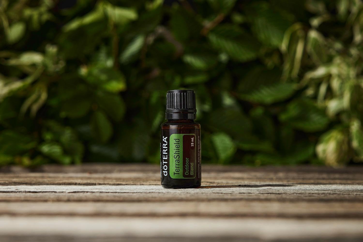 Close-up of doTERRA TerraShield Outdoor Blend cap highlighting a secure seal for travel.