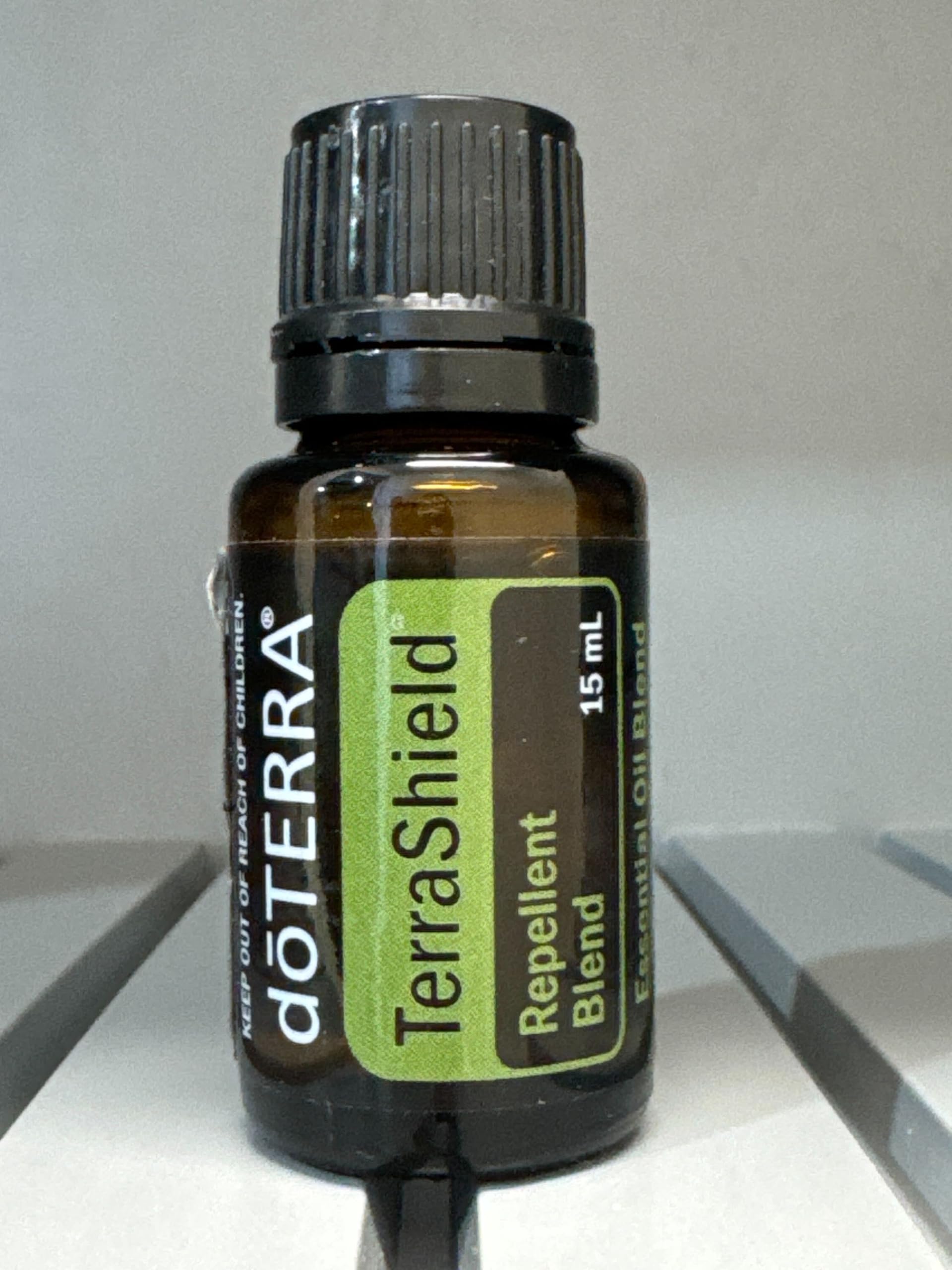 TerraShield Outdoor Blend against a field backdrop during outdoor gatherings.