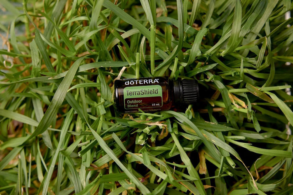 Active outdoors scene with TerraShield Bottle within reach during hiking for outdoor irritant defenses.