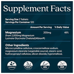 Doctor's Best magnesium glycinate lysinate tablets close-up showing smooth, coated pills