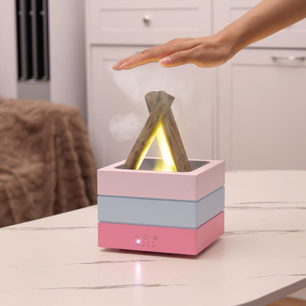 DoReFaSol bonfire diffuser releasing aroma with gentle mist.