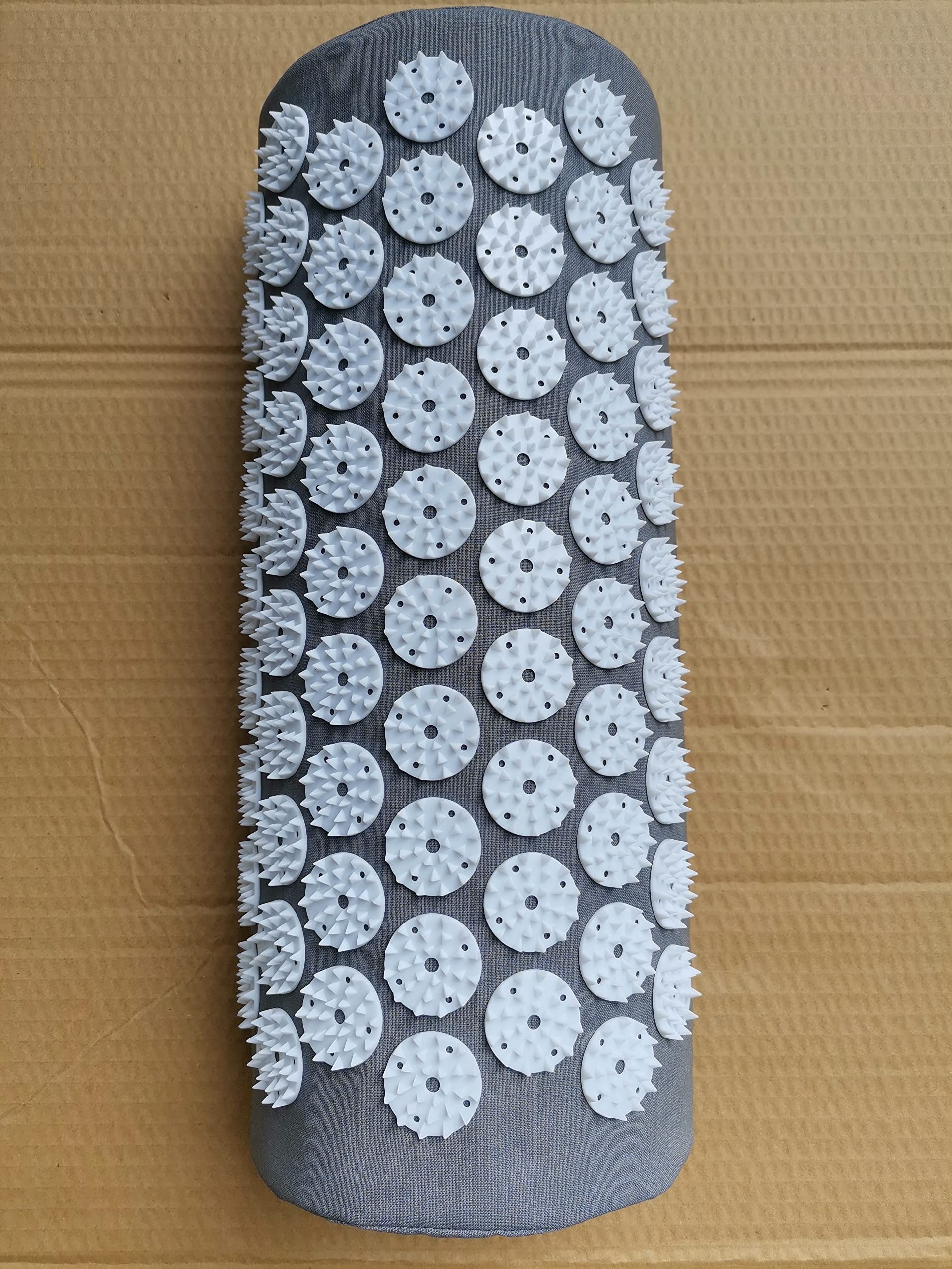 DoroSun acupressure pillow used on neck for tension relief