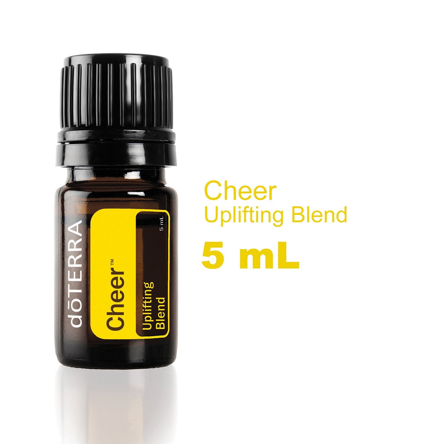 doTERRA Cheer bottle pour releasing citrus-spice scent.