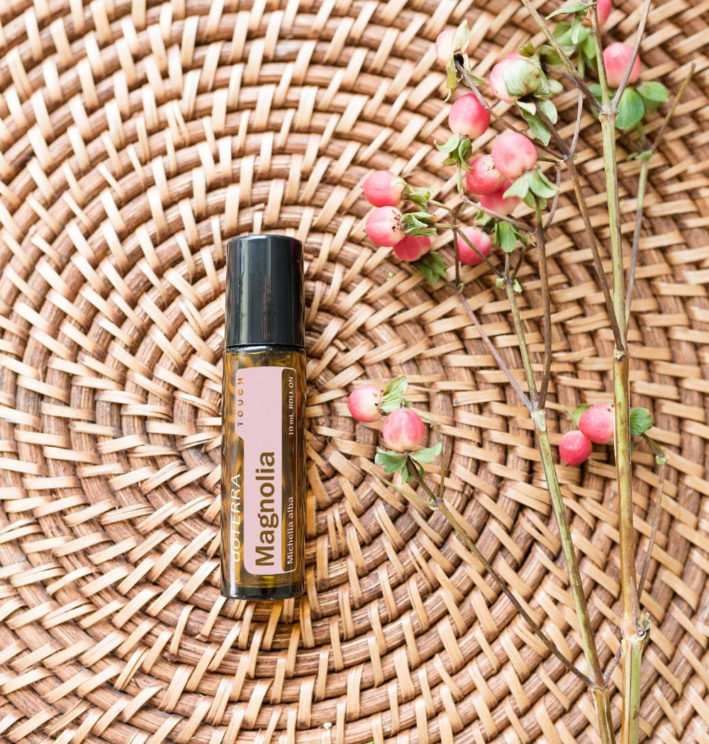 doTERRA Magnolia Touch fragrance diffusion scene suggesting mood uplift.