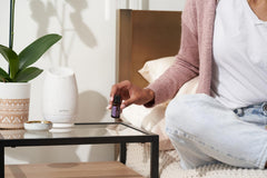 doTERRA Lavender oil close-up dropper releasing soothing essential oil