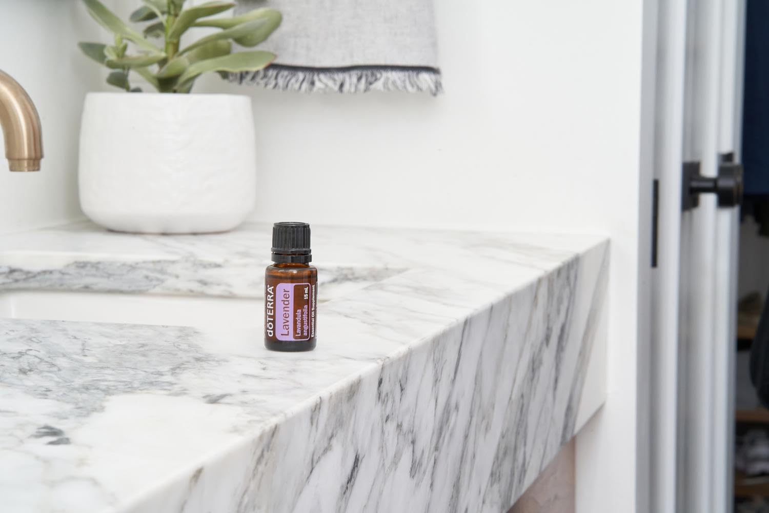 doTERRA Lavender oil in diffuser on a table for aromatherapy