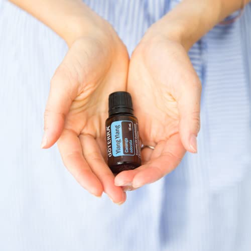 doTERRA Ylang Ylang hair care bottle for nourishing routine
