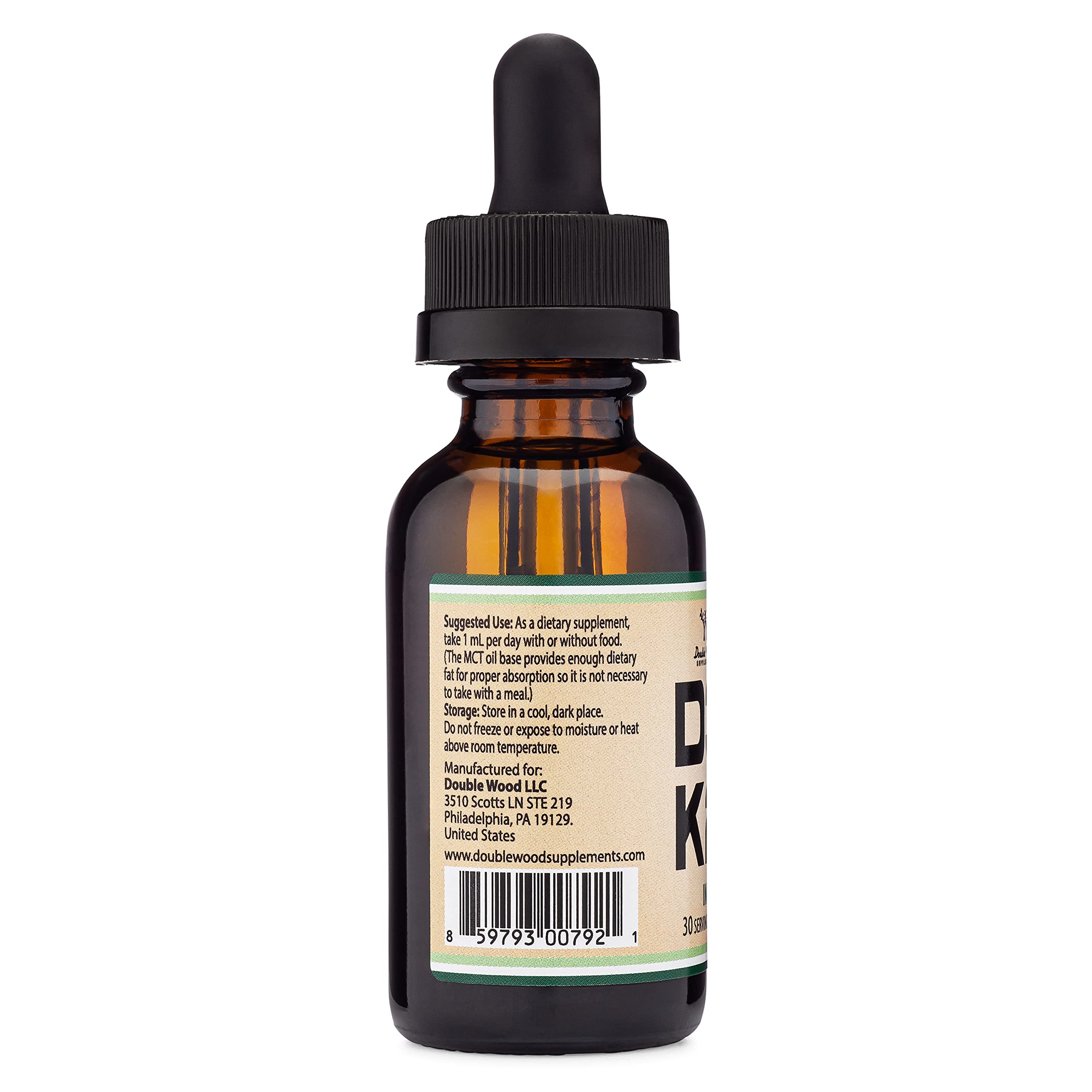 Double Wood D3 K2 drops on morning countertop as part of daily routine.