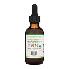 Double Wood Turmeric Drops bottle side label notes USA manufacturing and vegan-friendly formula.