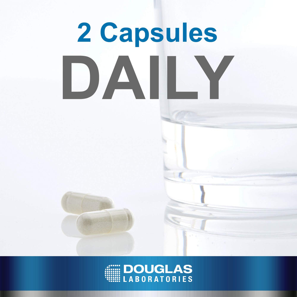 Douglas Laboratories Calcium Microcrystalline Hydroxyapatite capsules closeup shows vegetarian capsules for clean intake.