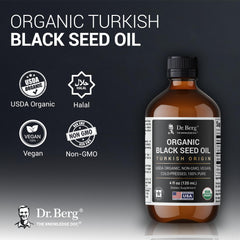 Dr. Berg Black Seed Oil being poured for easy dosage and servings