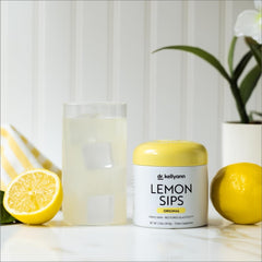 Measuring scoop shows serving size for Dr. Kellyann Lemon Sips.
