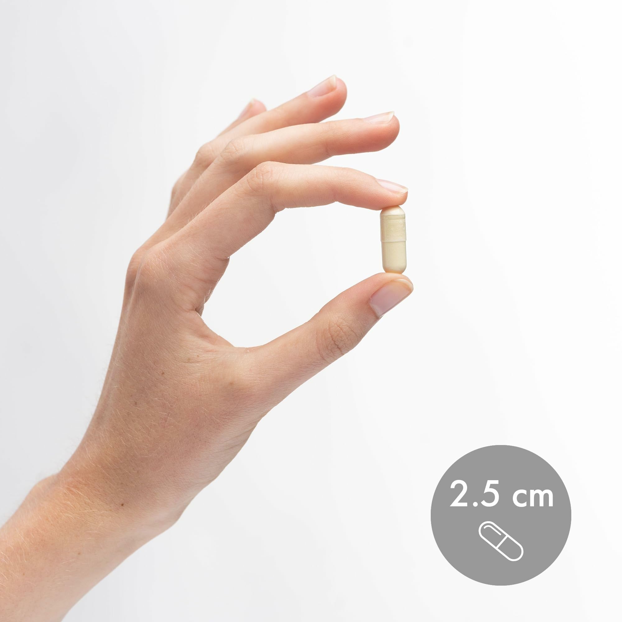 Capsules on natural wood surface suggest premium supplement aesthetics and durability.