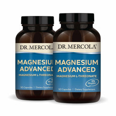 Dr. Mercola Magnesium Advanced bottle pouring Magtein magnesium for daily brain support.