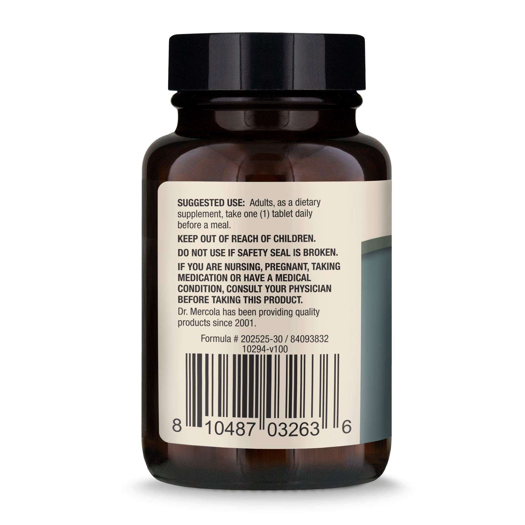 Pouring Dr. Mercola Organic Chaga bottle for convenient daily intake