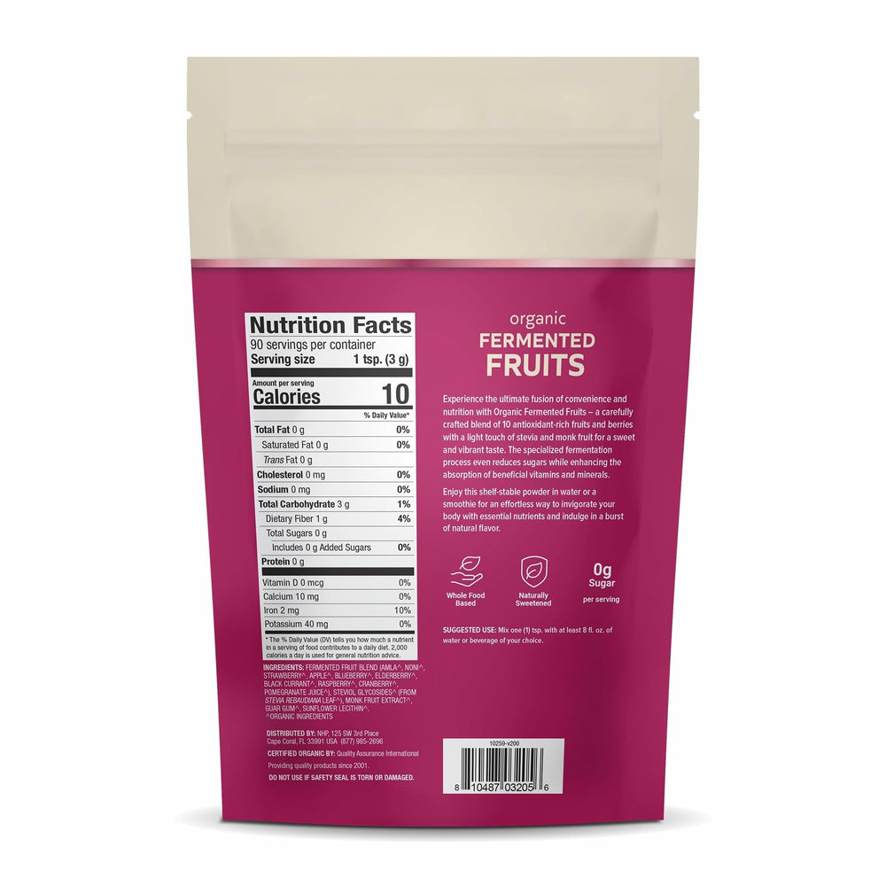 Dr. Mercola Organic Fermented Fruits powder being measured for easy mixing into smoothies