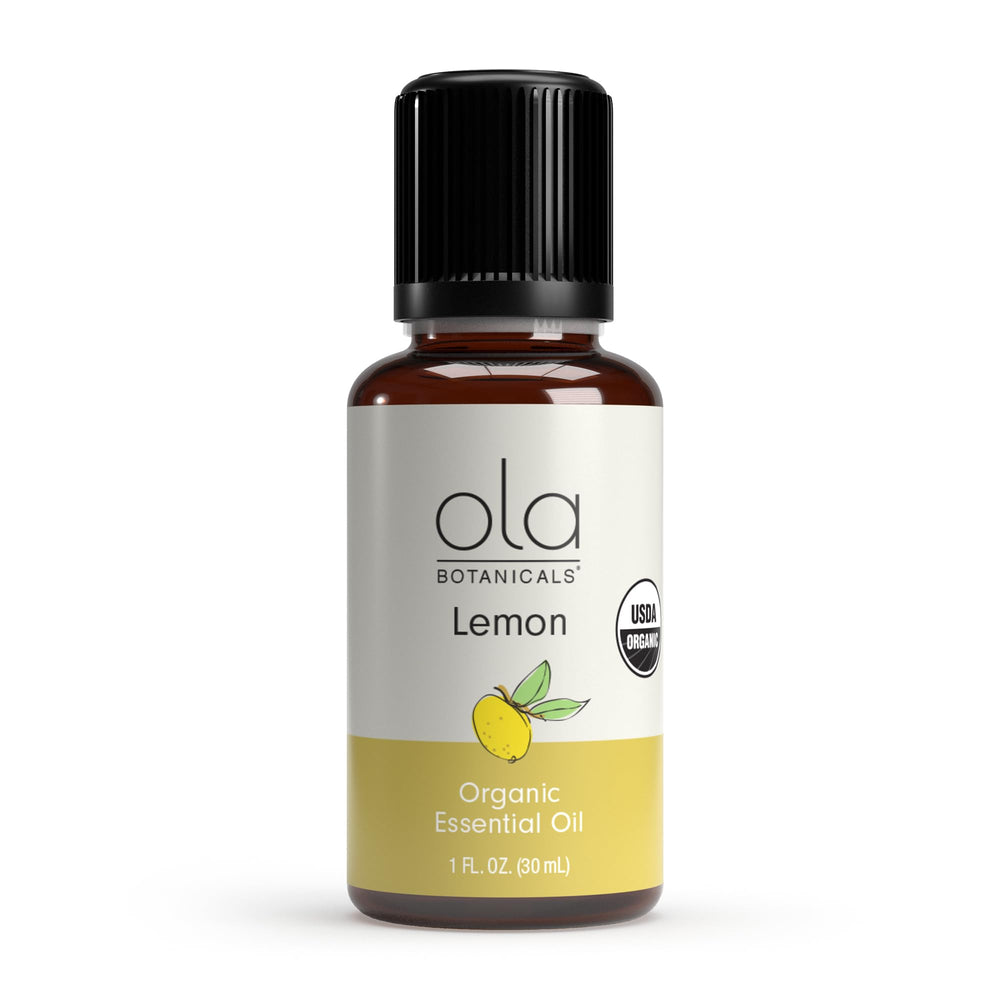 Dr. Mercola Organic Lemon Essential Oil bottle with refreshing citrus aroma for uplifting spaces.