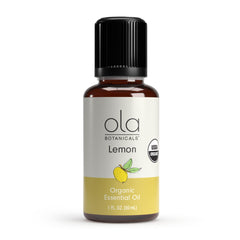 Dr. Mercola Organic Lemon Essential Oil bottle with refreshing citrus aroma for uplifting spaces.